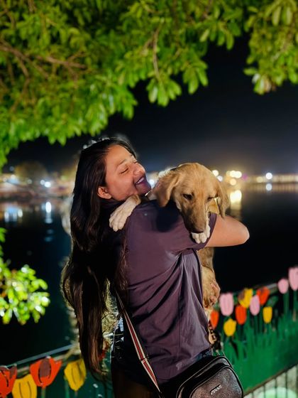 Trips are incomplete without meeting cute little friends along the way. Holding this puppy by the lake at night was a moment of pure, simple happiness.