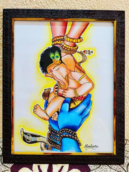 A unique and emotional depiction of baby Ganesha held lovingly by his parents, Shiva and Parvati. This colorful, framed piece is perfect for home decor and brings a sense of divine love to any space.