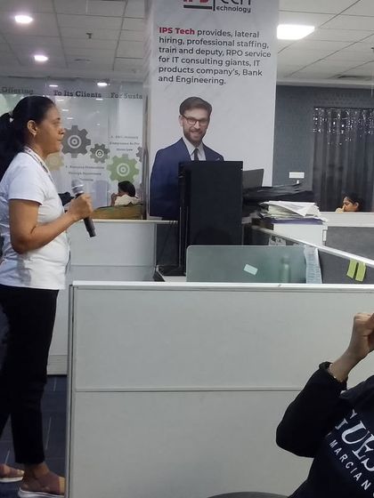 An instructor provides verbal cues during a breathing exercise. Clear and gentle guidance ensures that even absolute beginners can participate and benefit from the session.