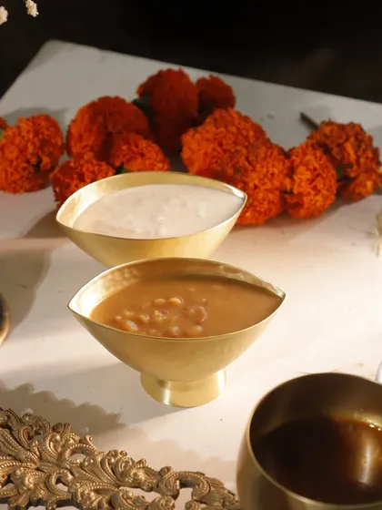 A closer look at the two kings of Kerala desserts: Ada Pradhaman, made with rice flakes and jaggery, and Palada Payasam, a delicate milk-based pudding. A truly sweet dilemma.
