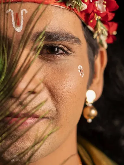 A close up shot as Krishna from our Janmashtami project. The makeup and details, like the peacock feather, are essential for bringing a character to life in a narrative dance piece.