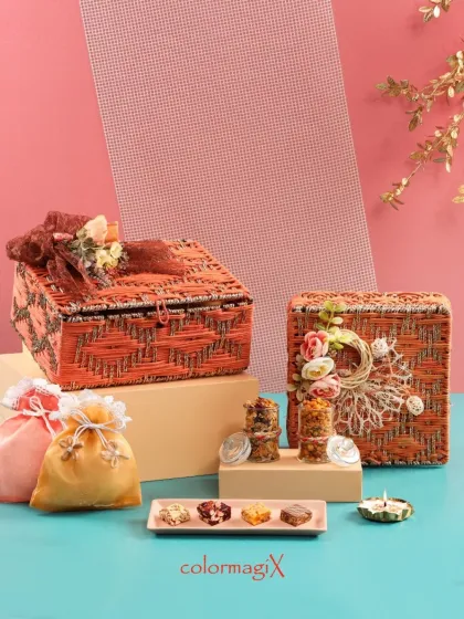 Our orange jute hampers are adorned with beautiful floral and macrame details. These boxes are perfect for those who appreciate handcrafted artistry and eco-friendly materials.