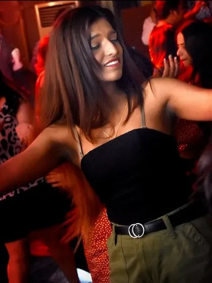 A happy guest lost in the music on the dance floor. Seeing these moments of pure joy is what drives me. It's proof that the right music and atmosphere can make any night unforgettable.