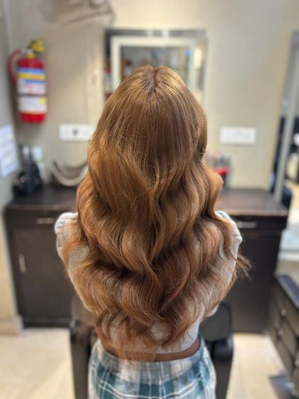 Another angle of our popular ash blonde color, showing its dimension and shine.