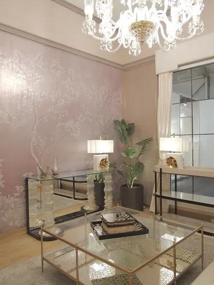 Another angle of the Sitananda showroom, where the metallic wallpaper provides a luxurious and sophisticated backdrop for the high-end furniture.
