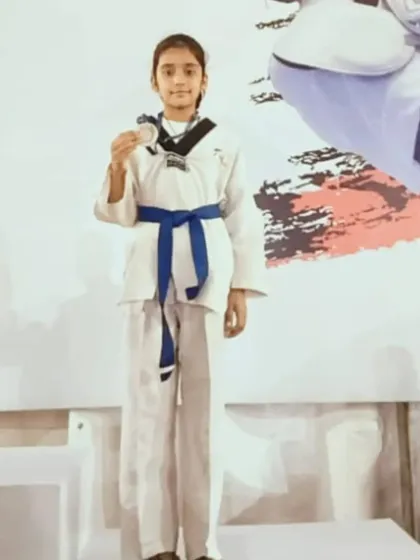 My student Naysha Sharma proudly displaying her silver medal at the CBSE National Taekwondo Championship in Uttarakhand. She fought hard and made us all proud.