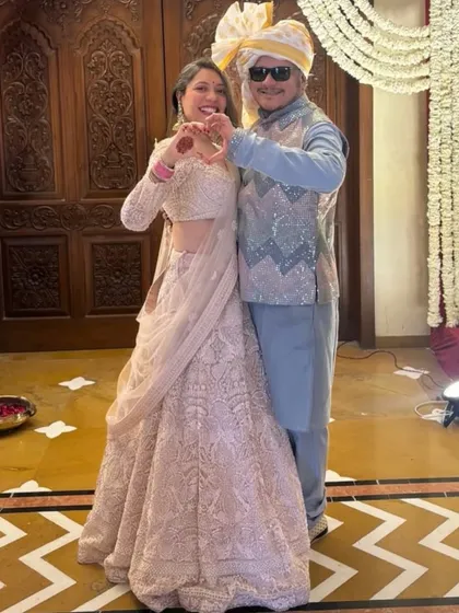 We love dressing up couples for their big moments. This client chose a beautiful pastel pink embroidered lehenga, and we paired it with a custom powder blue kurta and a sequined bandi jacket for him.