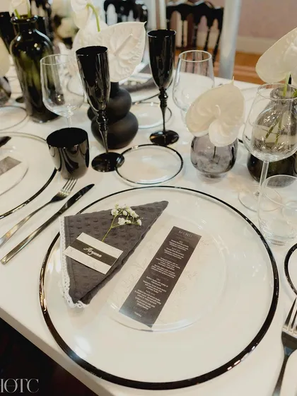 The details are everything. For a pre-wedding dinner in Lake Como, we designed a sophisticated all-black-and-white theme, where every element, from the anthuriums and vases to the custom cutlery and glassware, was chosen to exude timeless elegance.