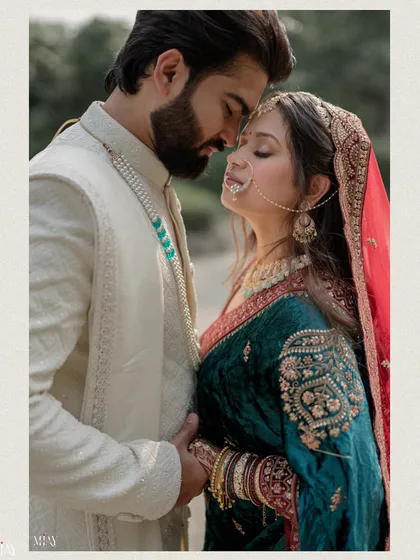 An intimate and artistic portrait of a couple, capturing a quiet moment of love during their '2 States' wedding celebration.