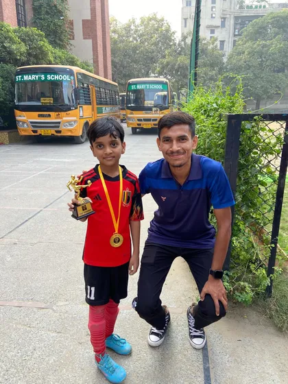 Shreyash, our Top Scorer, with his award. We focus on developing sharp shooters from a young age.