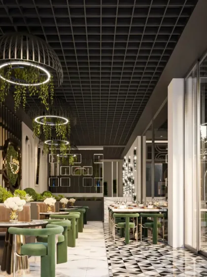 A long shot of the dining area, showcasing the geometric floor pattern and hanging pendant lights with greenery. The layout is designed for comfortable circulation while maintaining a chic, cohesive aesthetic.