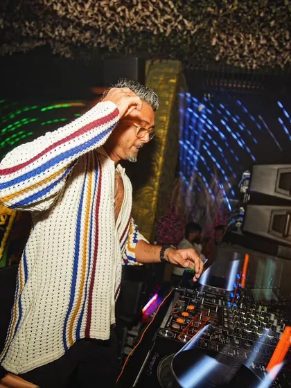 At the decks in Mumbai, with light trails swirling around me. This photo perfectly visualizes the electrifying sound and energy of my set.