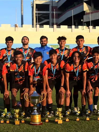 Our trophy cabinet is expanding. The team poses with their haul of trophies and medals after a successful tournament.