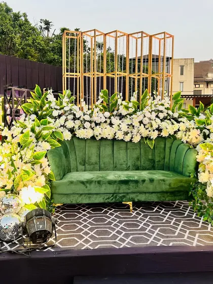 Another perspective of the elegant green and white photo stage.