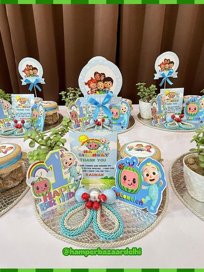 These Cocomelon hampers are arranged on silver trays, making for a beautiful and budget-friendly return gift option.