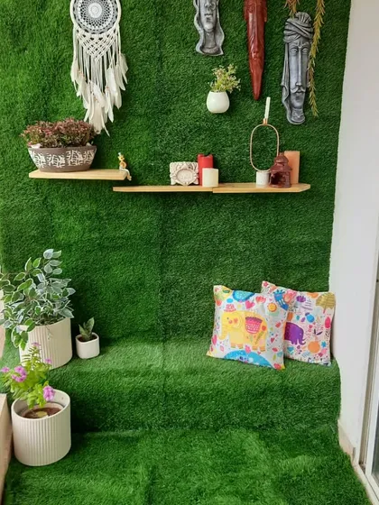 We call this the "Green Carpet" balcony. By covering the entire floor and back wall with high quality artificial grass, we created a super cozy and comfy space that feels like a private garden. It's a unique look that is all about lush, natural texture.