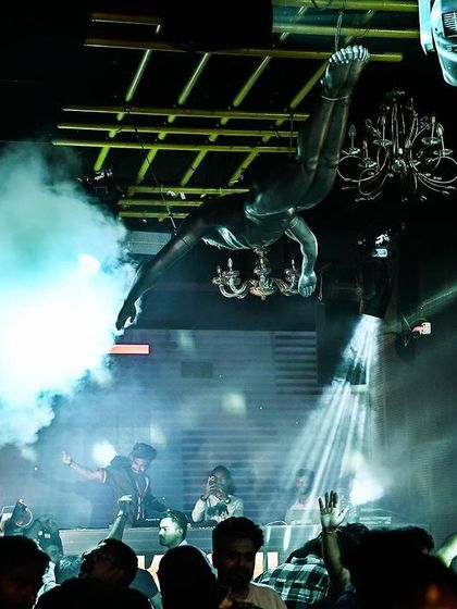 A duplicate shot of the smoke and acrobatics at Mikachi Club.