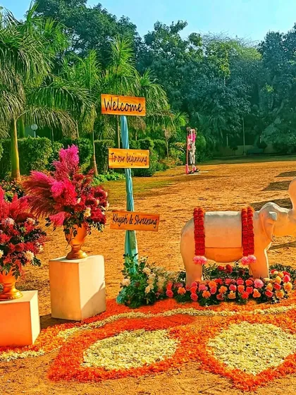 A warm, traditional welcome sets the tone for the entire celebration. For this outdoor event, I combined a floral rangoli, a classic elephant statue, and personalized wooden signs to create a grand and culturally rich entrance for the guests.