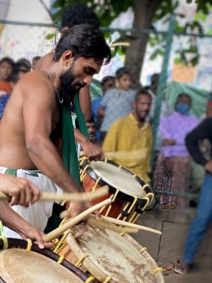An intense, up-close moment during a live performance. This is the focus and power that goes into every single beat of the drum.