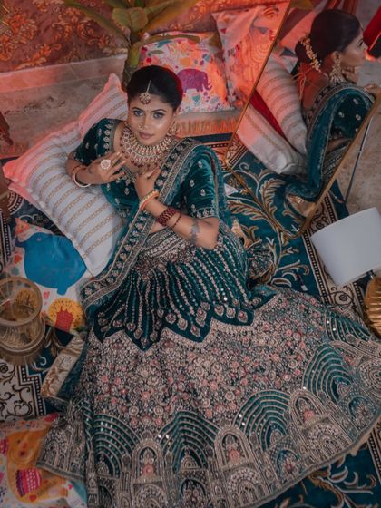 An artistic top-down shot showing the incredible detail of the lehenga.