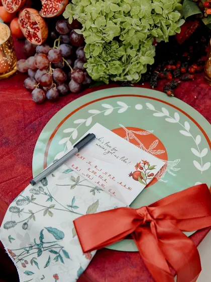 A beautifully designed place setting with a custom menu and game card. We believe every detail on the table should be a conversation starter and a work of art.