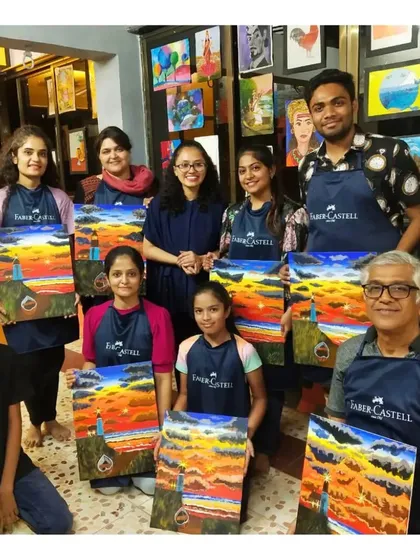 Art is a celebration here. This is a glimpse into one of our lively workshops where artists of all ages and skill levels come together to learn, create, and proudly display their finished canvas paintings.