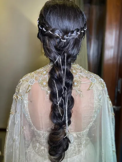 The full view of this intricate diamond-studded braid, a true statement hairstyle.