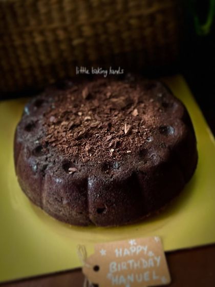 Nothing beats a simple, rich whole wheat dark chocolate cake for a child's birthday. I use real couverture chocolate, so the flavour is deep and satisfying, never bitter.