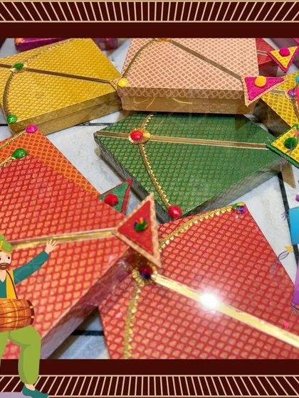 My colorful 'Patang Mithaai' boxes, presented with a fun, animated border to highlight their festive appeal.