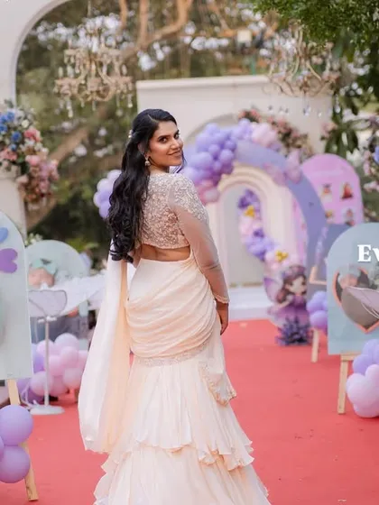 Welcome to a real-life fairyland. For Varnnika's first birthday, I created this magical entrance walkway lined with adorable photos of her first year, leading guests into a world of pastel rainbows and princess dreams.