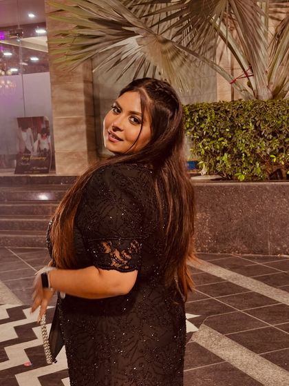 A close-up of the client in her black fish-cut gown. Her smile and confidence are the best testimonials.