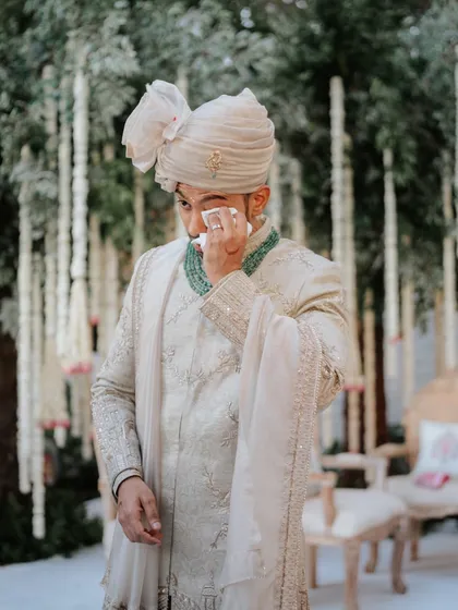 An unfiltered moment of emotion as the groom sheds a tear. These are the real, unposed memories I seek, the ones that tell the true story of your wedding day.