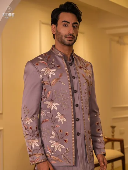 Our mauve Jodhpuri ensemble is a testament to detailed craftsmanship. The intricate floral embroidery and beadwork create a sophisticated look that is both unique and timeless.