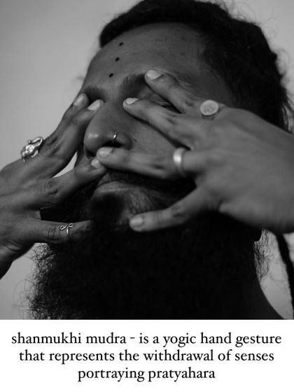 Shanmukhi Mudra, the gesture of closing the seven gates. This mudra is used to facilitate Pratyahara (withdrawal of the senses) by closing the eyes, ears, nose, and mouth, directing awareness inward for deep meditation.