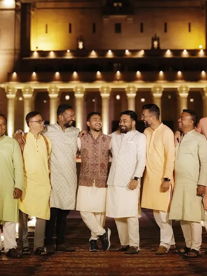 A candid version of the groomsmen photo, full of laughter and friendship. These unposed group shots are often the most memorable.