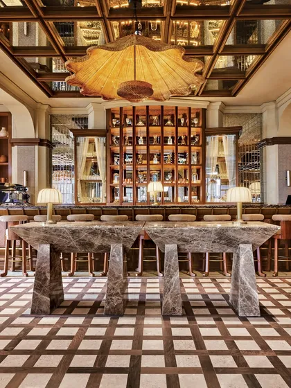 I thrive on collaborating with architects to bring grand visions to life. For the One 8 Commune restaurant, we created a foundation of timeless luxury with custom checkerboard flooring and monumental stone tables. This project showcases my capability to deliver high-impact surfaces at a commercial scale.