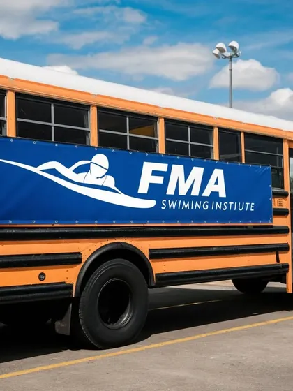 We take our message on the road. An FMA banner on a school bus advertises our services directly to schools and communities, where we offer coaching and lifeguard services.