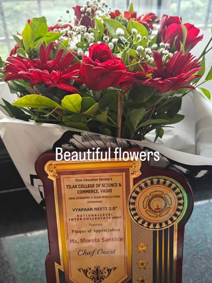 The beautiful flowers and plaque of appreciation I received from the Tilak Education Society after my talk. I am always grateful for the warm reception and the chance to connect with students and faculty.