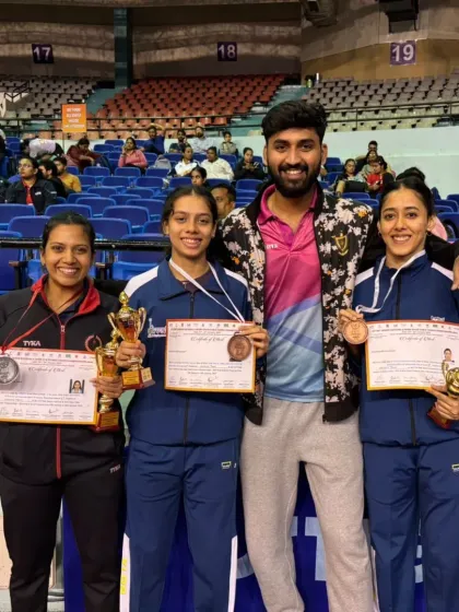 A celebratory photo with our players after their success at the Senior Nationals. The bond between our players and coaches is a key part of our success.