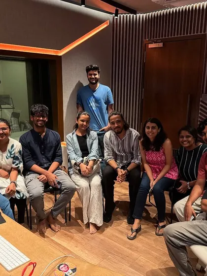 In the recording studio with my fellow artists, preparing for a major performance. These sessions are where the magic begins, from arranging vocals to rehearsing harmonies. This is a big part of my work as a session vocalist and collaborator.