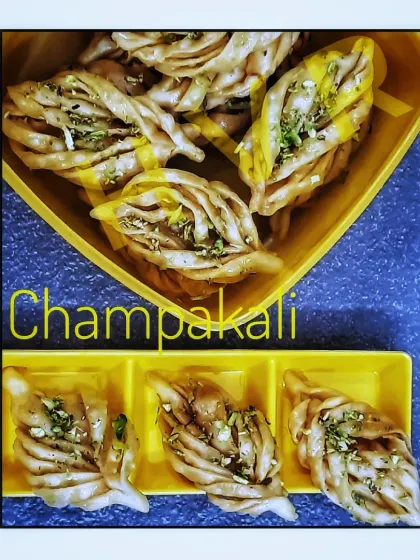 Champakali is a beautiful sweet inspired by the frangipani flower. This crispy, layered pastry is soaked in sugar syrup and is a popular sweet in Western Maharashtra.