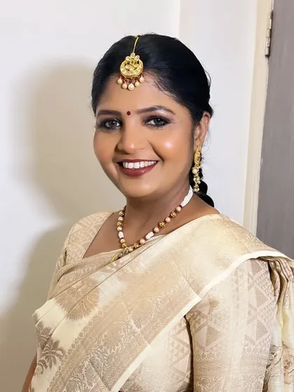 Another portrait of this elegant client, her smile radiating warmth and happiness.