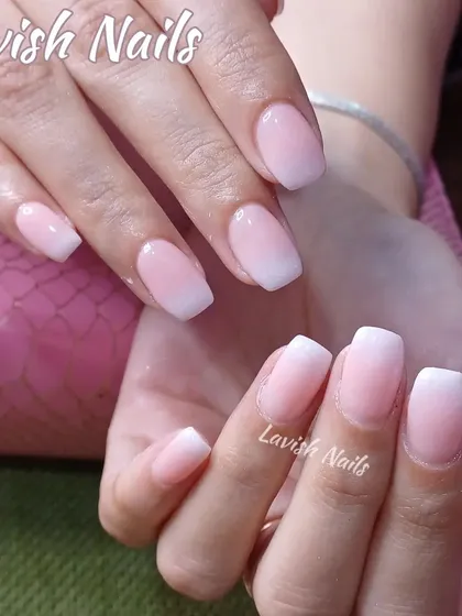 A soft and natural-looking Baby Boomer ombre on shorter, coffin-shaped nails.