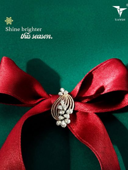 Shine brighter this season. This beautiful diamond brooch, styled on a festive red ribbon, is a meaningful gift that will stay with you long after the season ends.