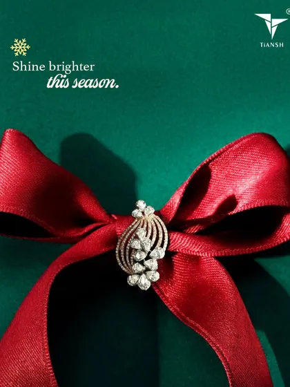 Shine brighter this season. This beautiful diamond brooch, styled on a festive red ribbon, is a meaningful gift that will stay with you long after the season ends.