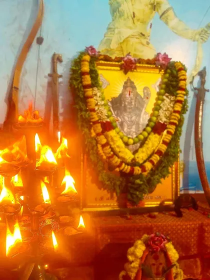 The warm glow of diyas illuminates the deity during our evening prayers. Light symbolizes the dispelling of ignorance and the dawning of wisdom, which is the ultimate goal of Dhanurvidya.