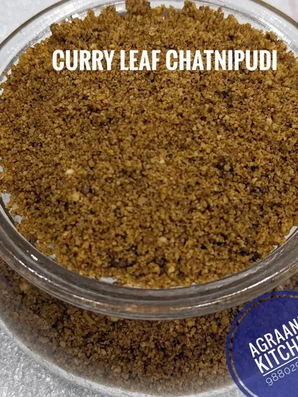 A close-up of my homemade Curry Leaf Chutney Pudi. This aromatic and healthy powder is made from freshly roasted curry leaves and lentils, perfect to mix with rice, or sprinkle on idli and dosa.