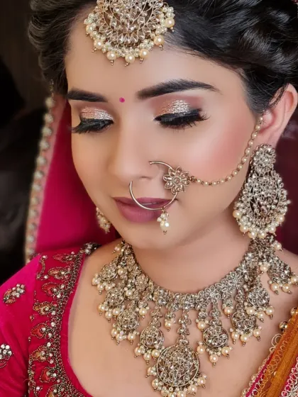 A close-up of the glittery eye makeup and flawless skin that defines my signature glass finish look.