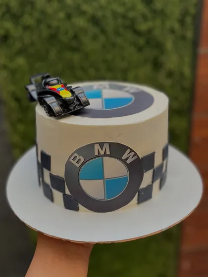 For the motor fanatic in your life. This custom BMW-themed cake, in our popular Roasted Almond Caramel flavor, shows how we can tailor a design to any passion or hobby.