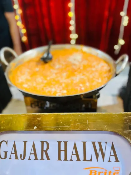 A close-up of the rich and delicious Gajar Halwa, slow-cooked with carrots, milk, and sugar.
